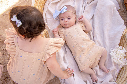 Sienna Ruffle Knit Pointelle Romper | Coastal Beige | WYLDE.