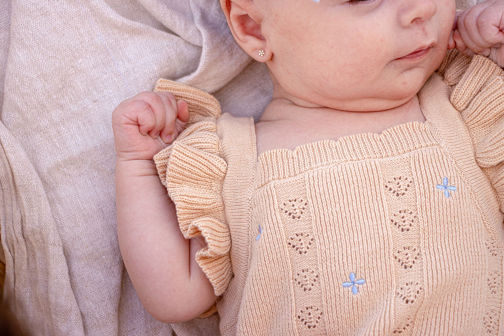 Sienna Ruffle Knit Pointelle Romper | Coastal Beige | WYLDE.