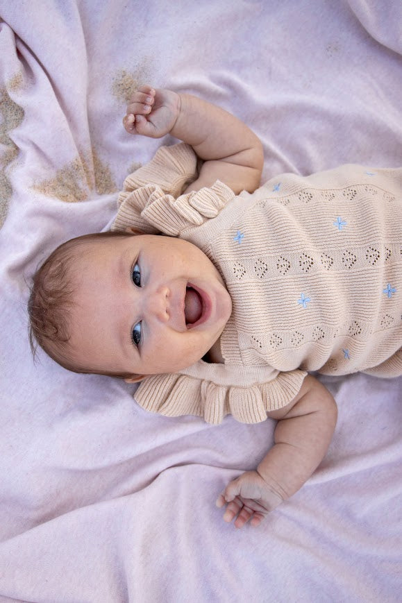 Sienna Ruffle Knit Pointelle Romper | Coastal Beige | WYLDE.