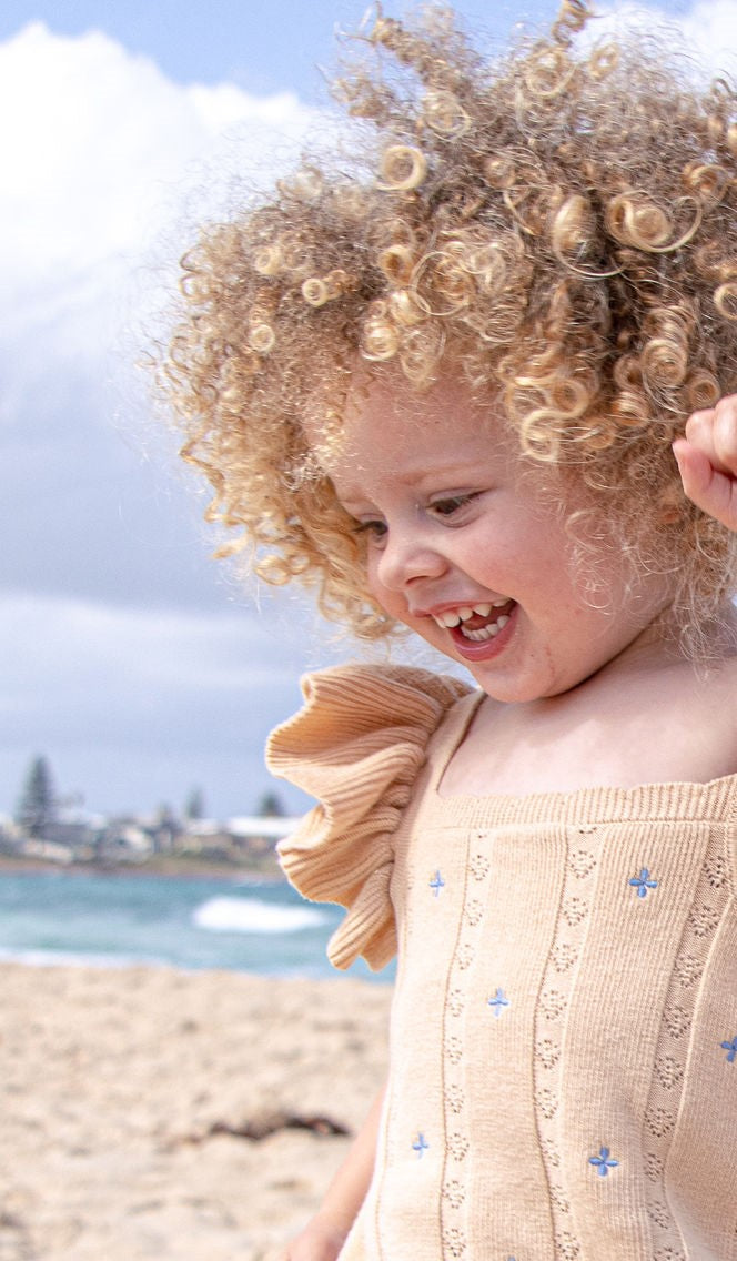 Della Ruffle Knit Pointelle Dress | Coastal Beige | WYLDE.